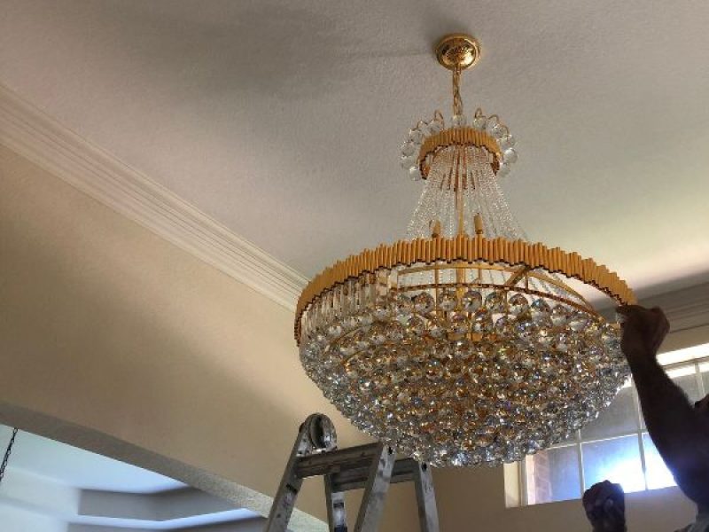 chandeliers install - BBG construction work of art